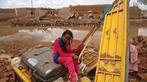 Adikeih March 2013  Child on the remains of destryed home